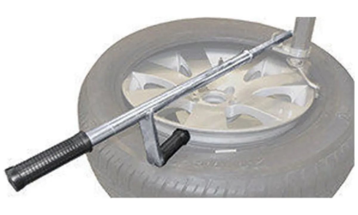  Устройство вспомогательное для прижатия борта шины (1)